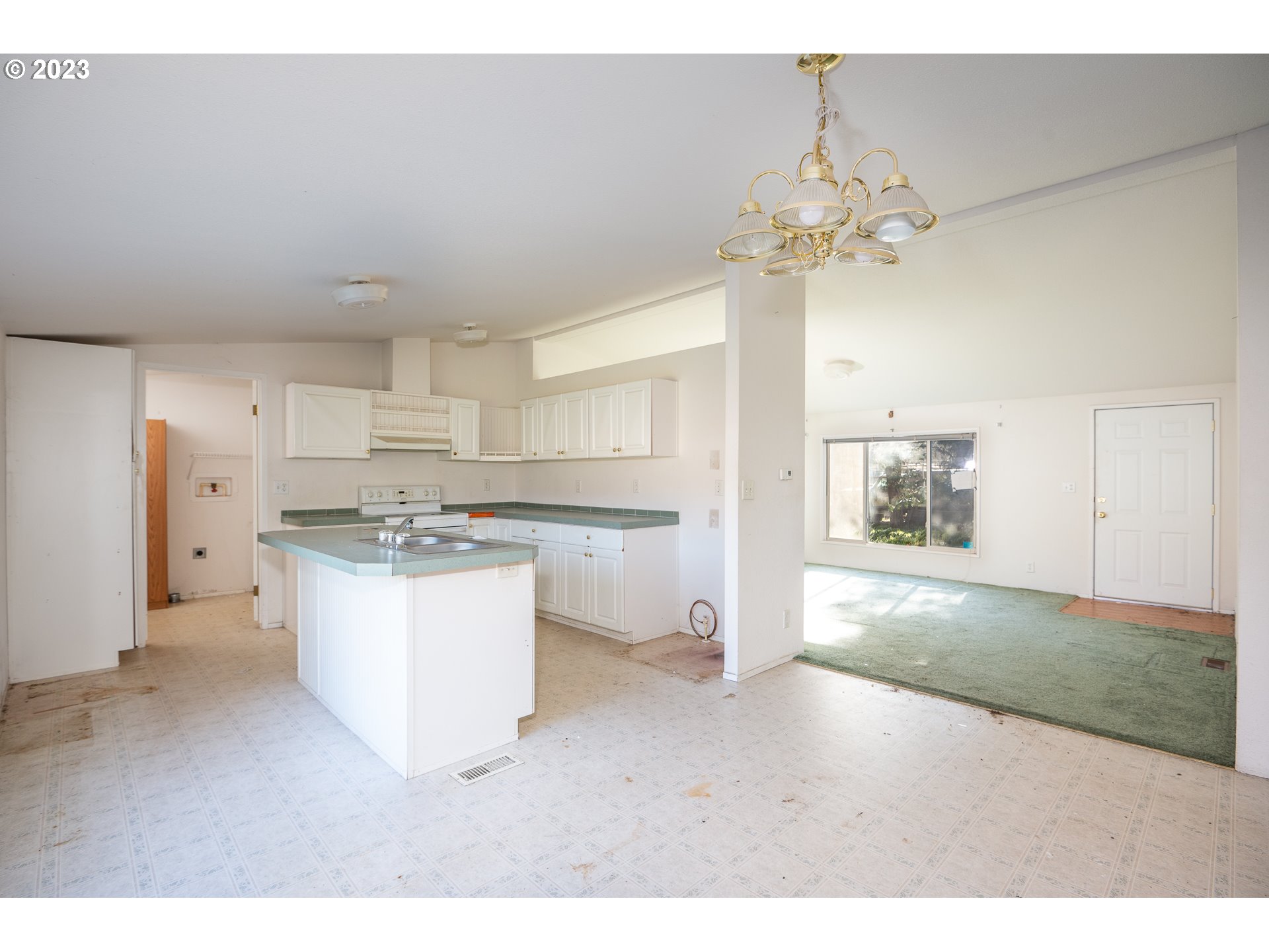 76367 Klohn Road Oakridge, OR 97463 - Photo 20 of 42 a kitchen with a refrigerator and a sink