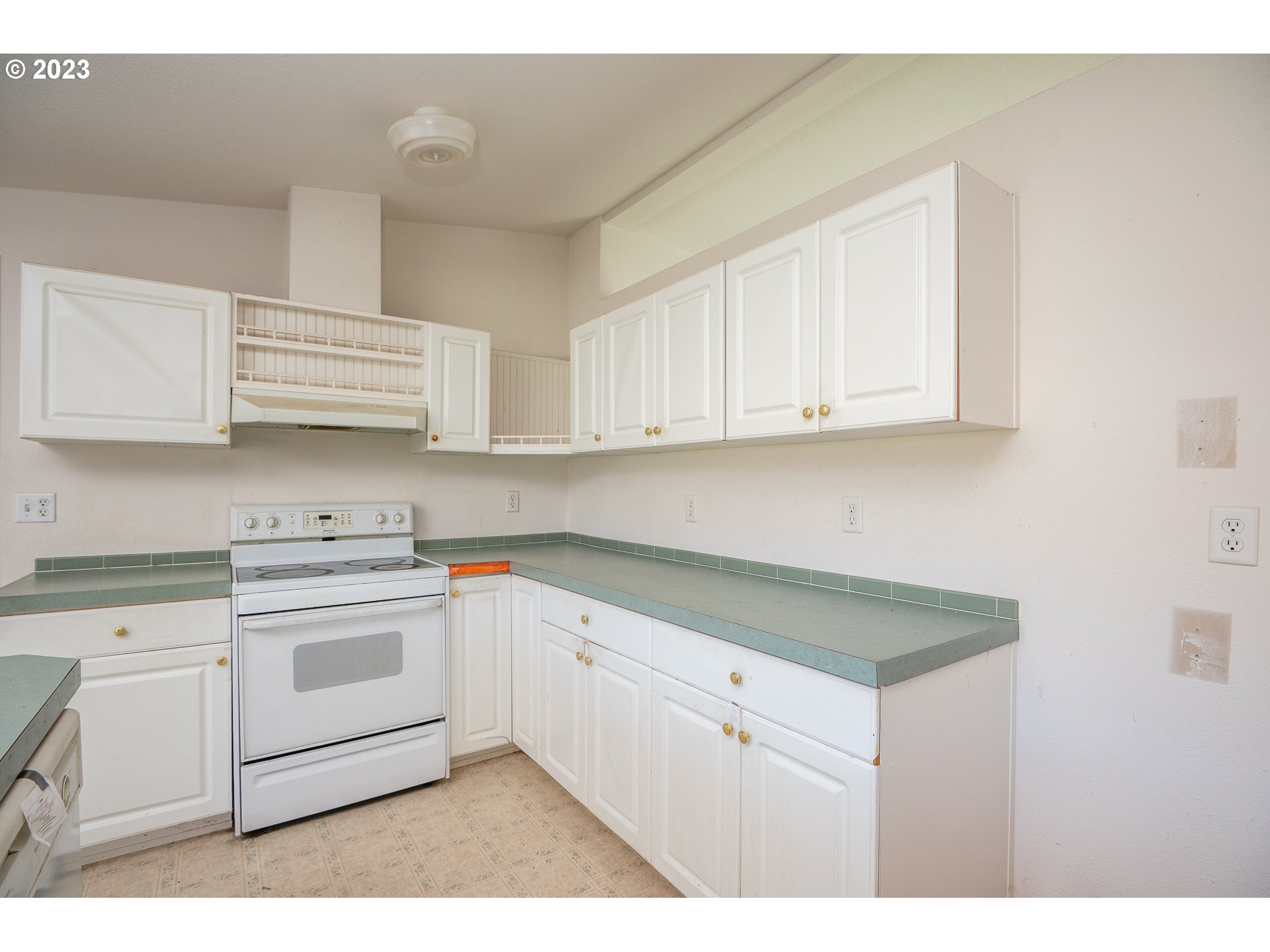 76367 Klohn Road Oakridge, OR 97463 - Photo 22 of 42 a kitchen with stainless steel appliances granite countertop a sink and cabinets