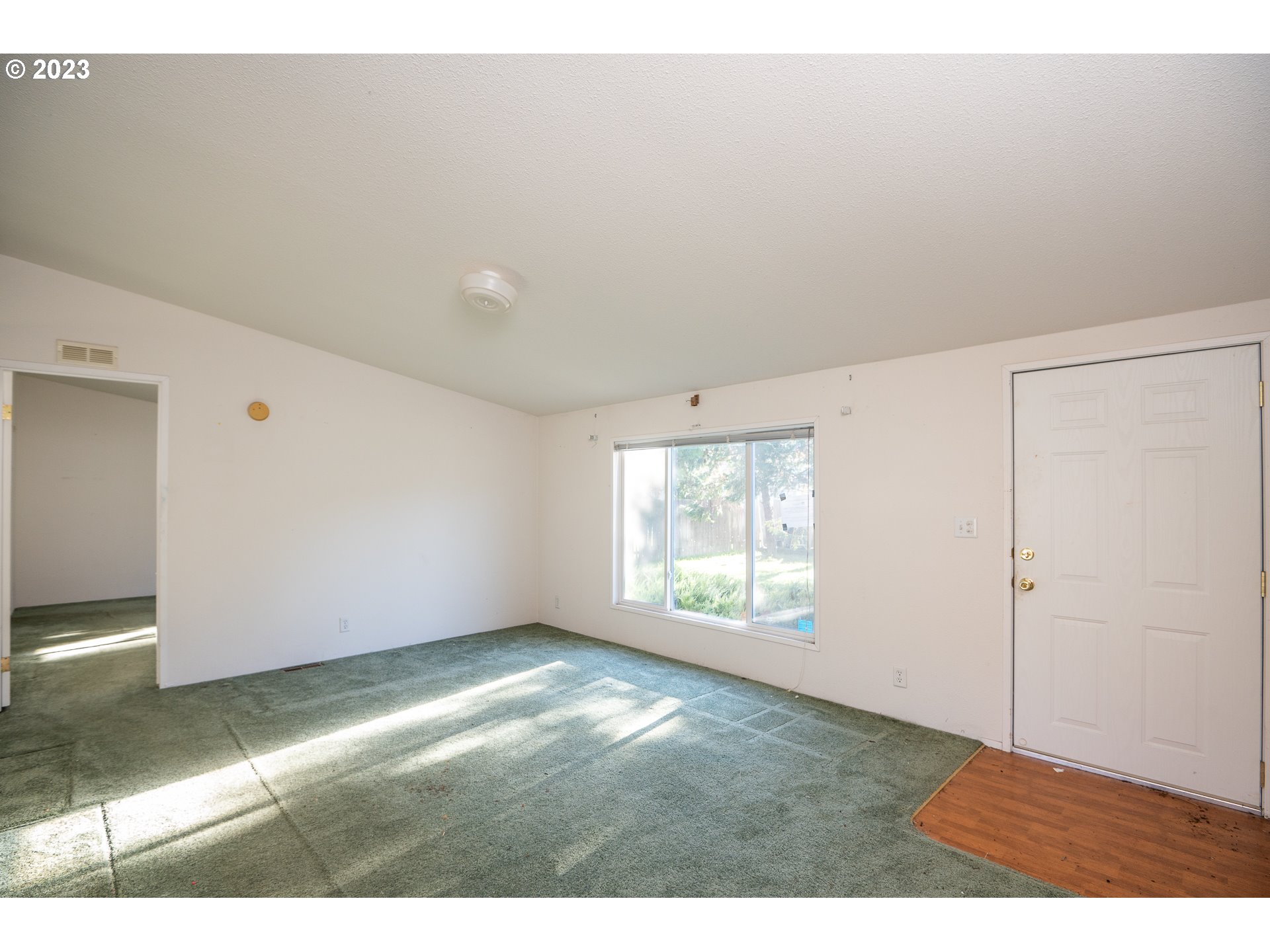 76367 Klohn Road Oakridge, OR 97463 - Photo 27 of 42 a view of an empty room with a window