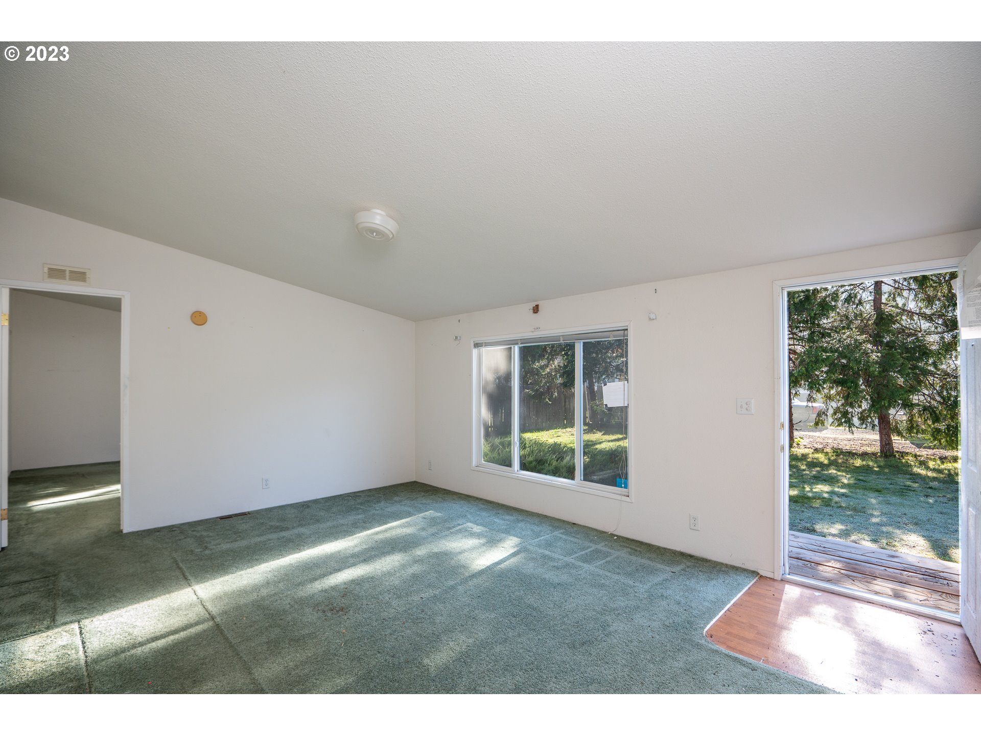 76367 Klohn Road Oakridge, OR 97463 - Photo 28 of 42 a view of an empty room with windows