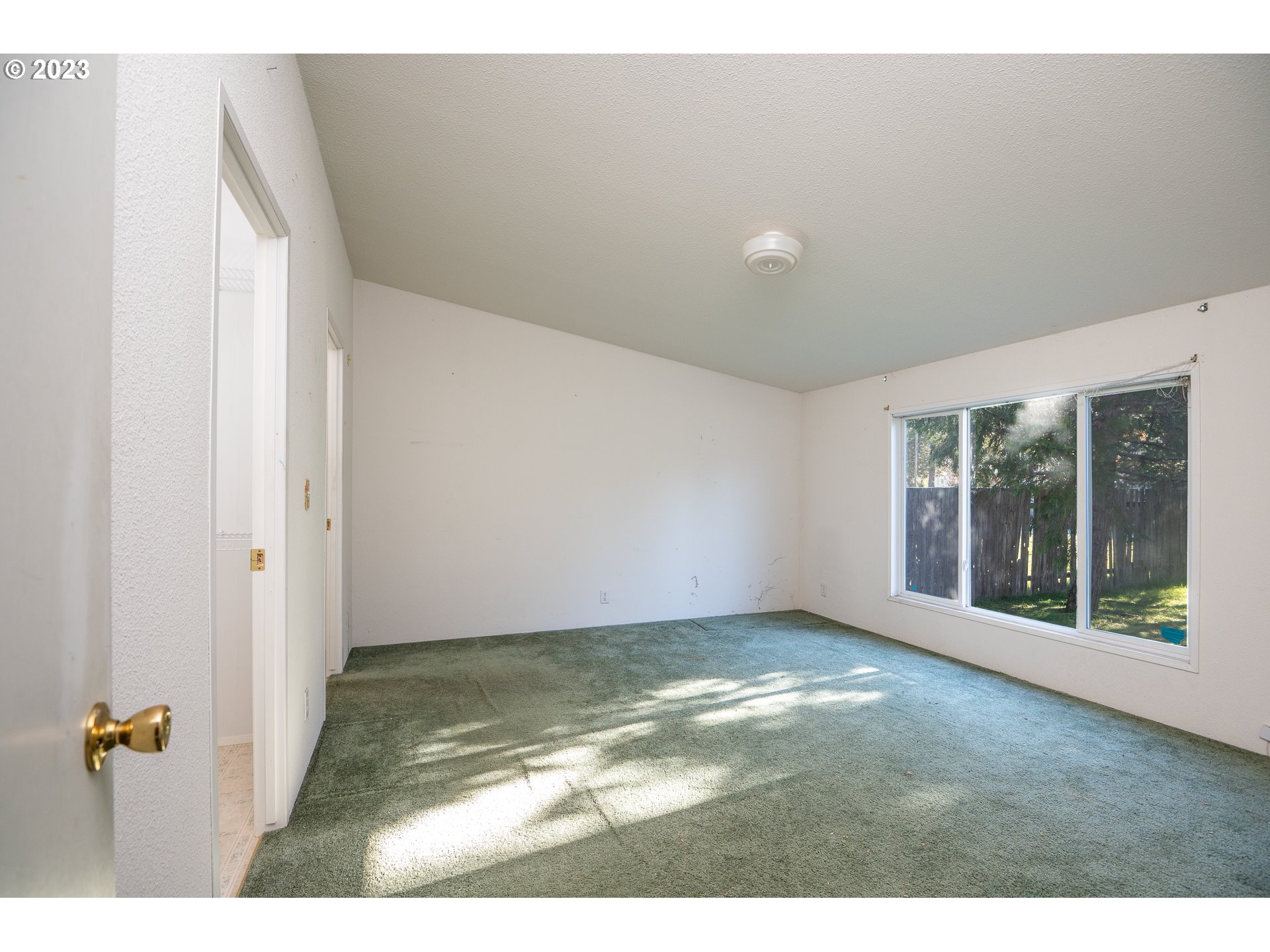 76367 Klohn Road Oakridge, OR 97463 - Photo 30 of 42 a view of an empty room with a window