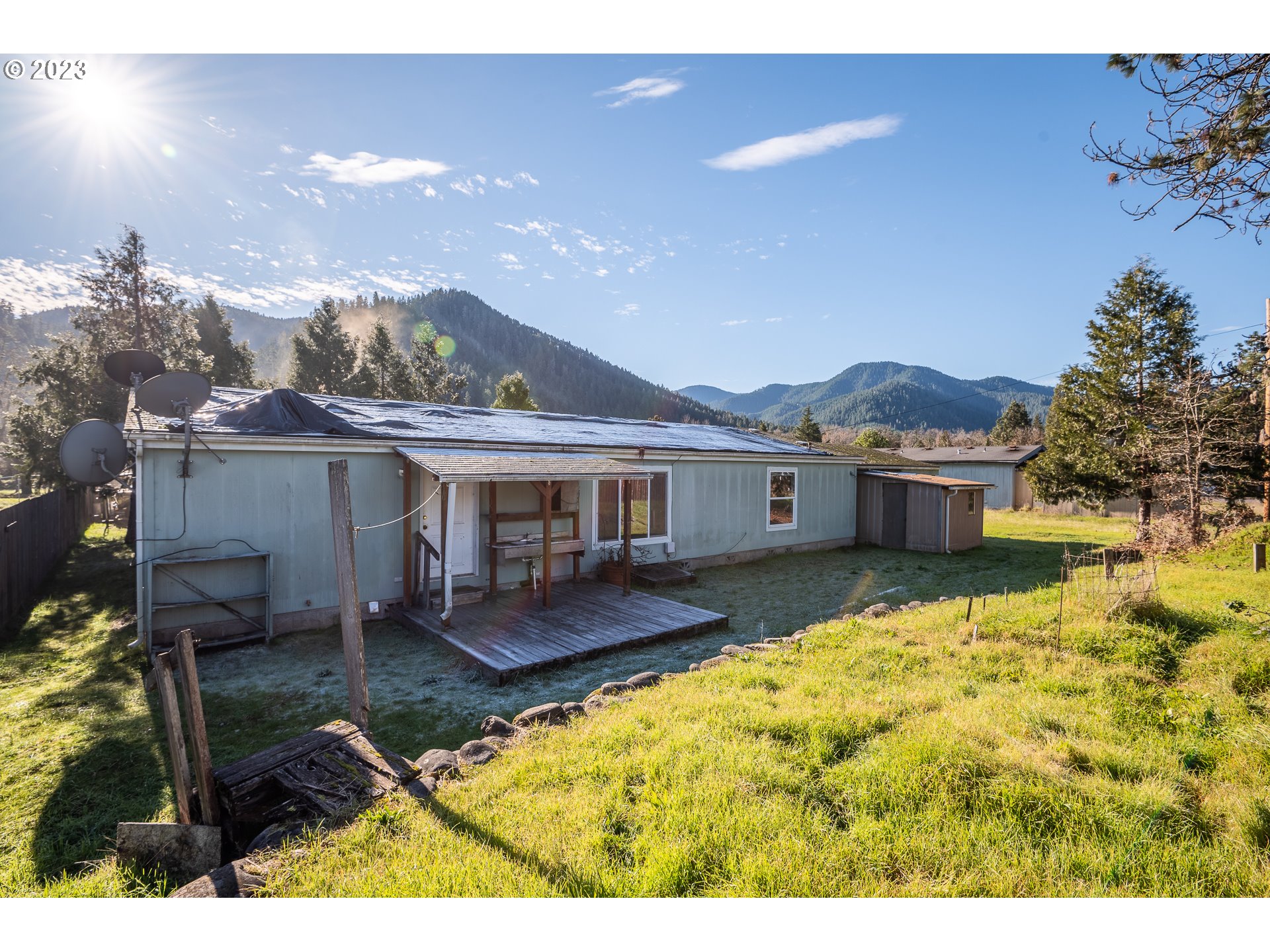 76367 Klohn Road Oakridge, OR 97463 - Photo 3 of 42 a aerial view of a house with a yard