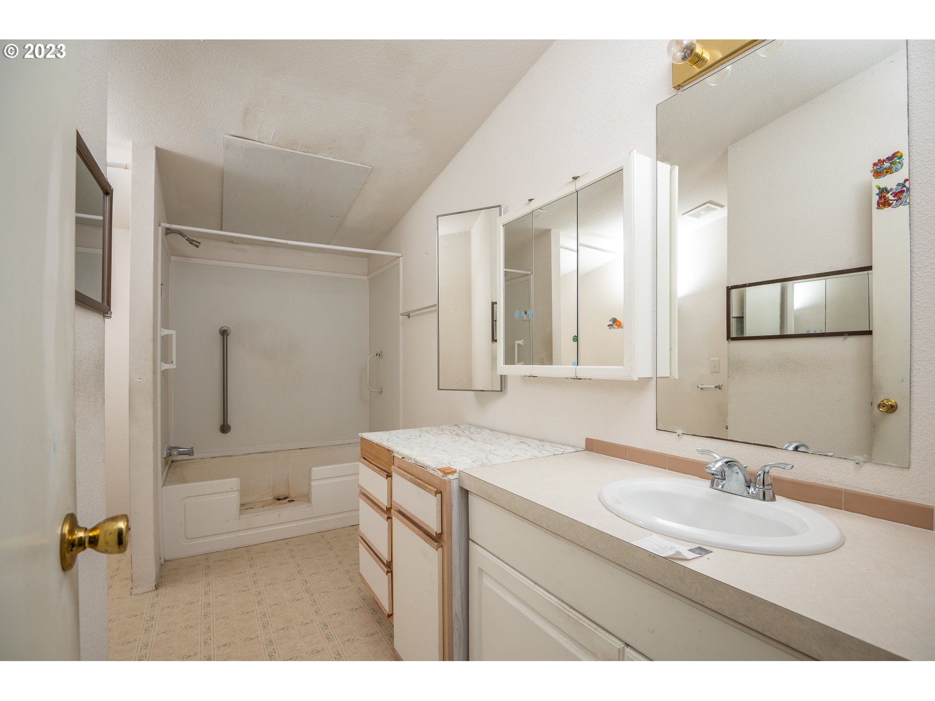 76367 Klohn Road Oakridge, OR 97463 - Photo 33 of 42 a bathroom with a granite countertop sink mirror and double