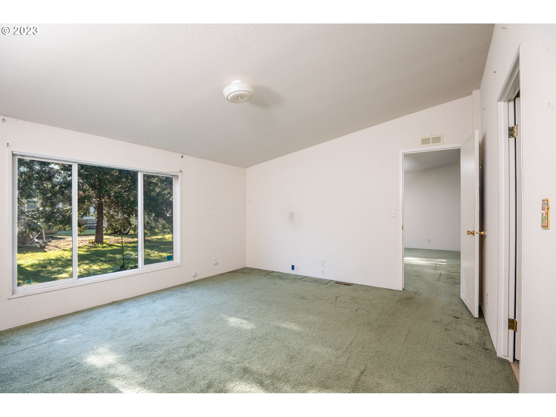 76367 Klohn Road Oakridge, OR 97463 - Photo 36 of 42 a view of an empty room with a window