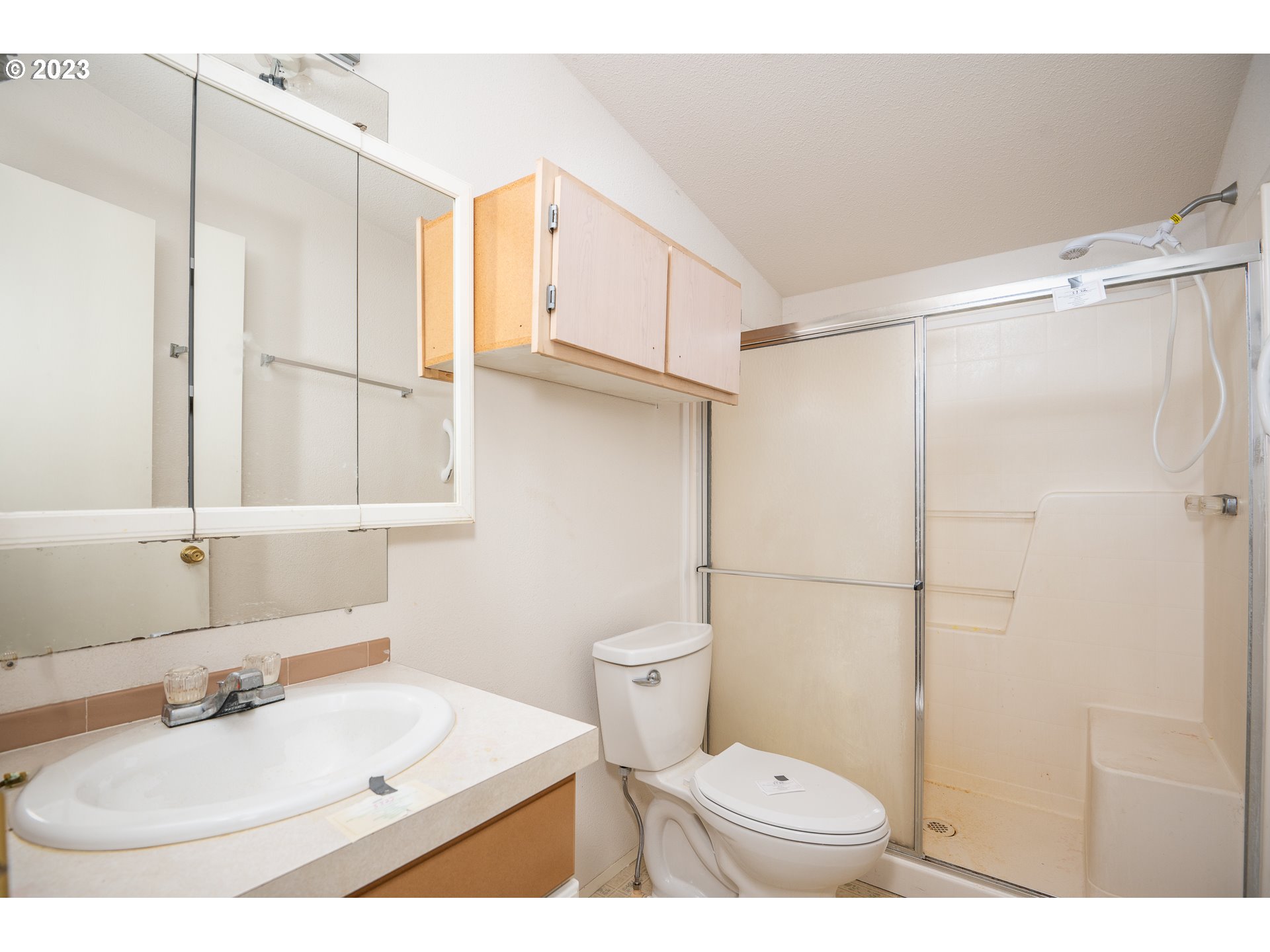 76367 Klohn Road Oakridge, OR 97463 - Photo 9 of 42 a bathroom with a sink toilet and shower