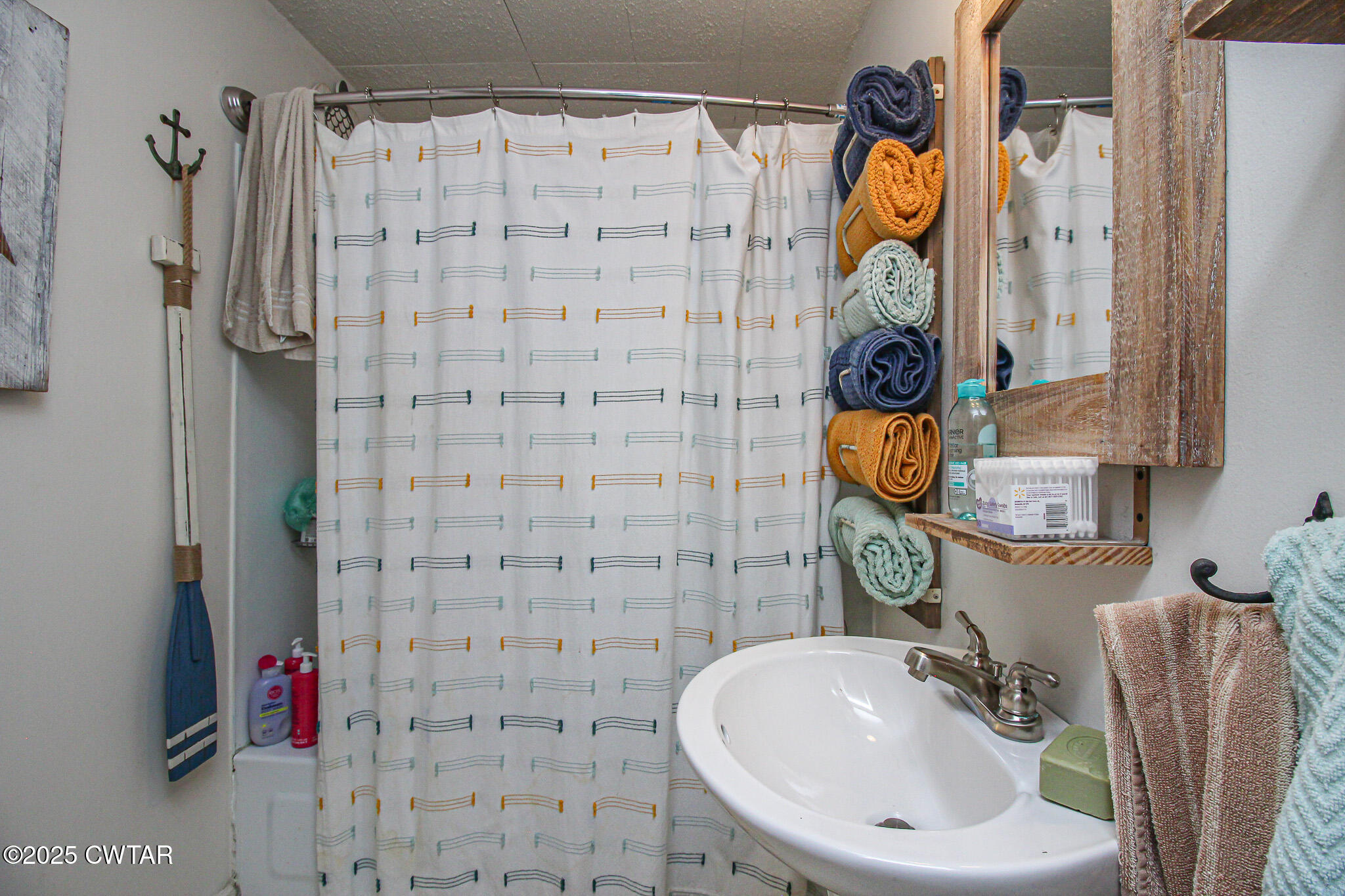 60 Moore Avenue Friendship, TN 38034 - Photo 11 of 14 a bathroom with a sink and a mirror