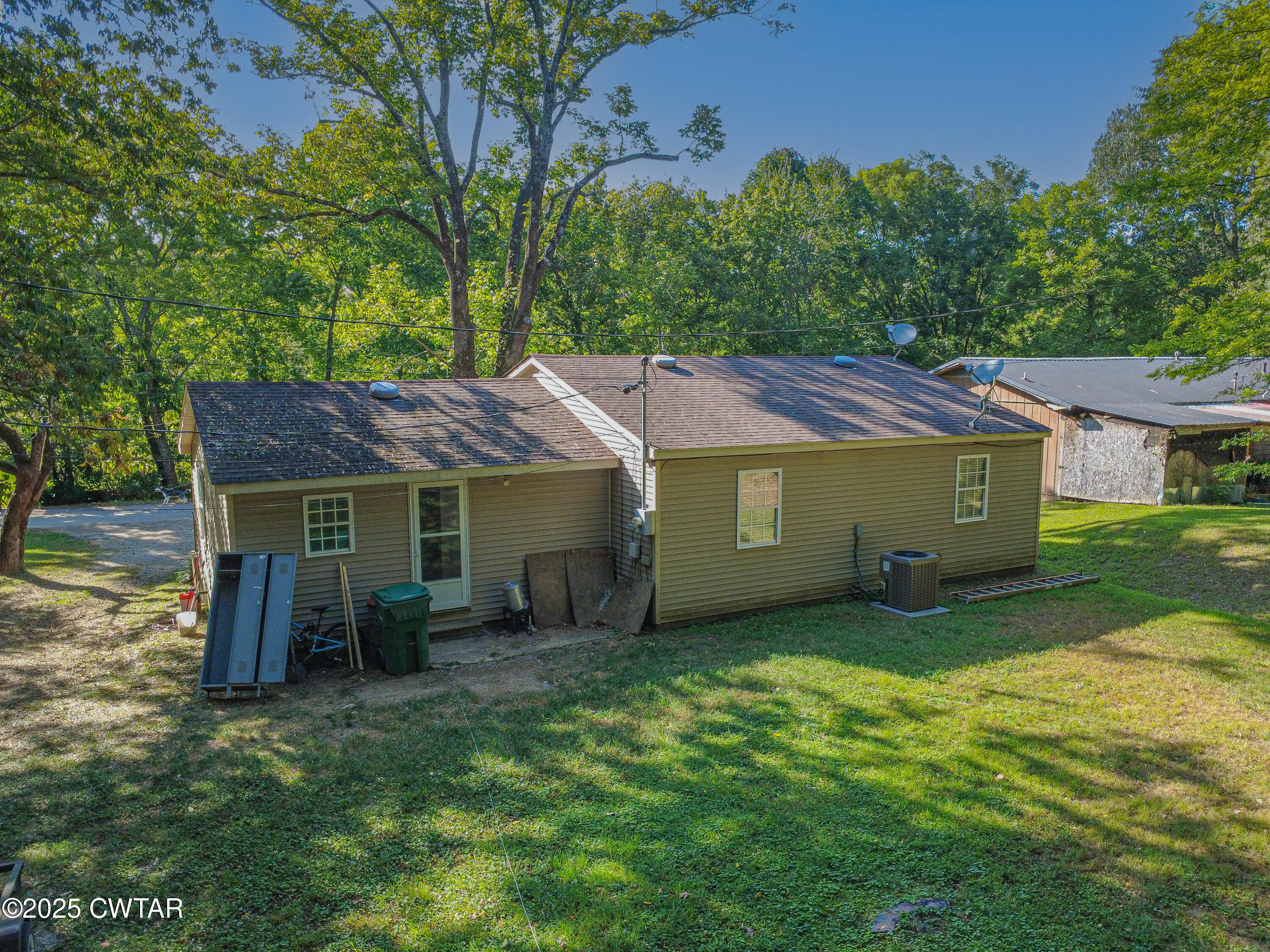 60 Moore Avenue Friendship, TN 38034 - Photo 12 of 14 a view of a house with a yard
