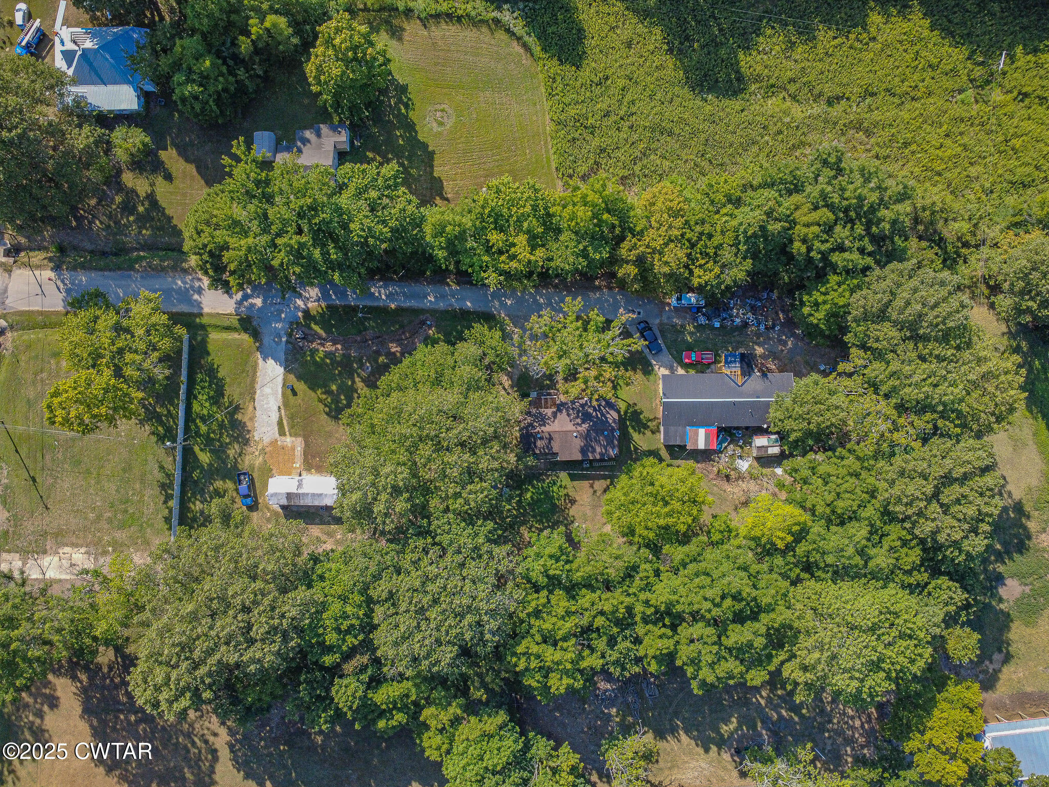60 Moore Avenue Friendship, TN 38034 - Photo 14 of 14 an aerial view of a house with a yard