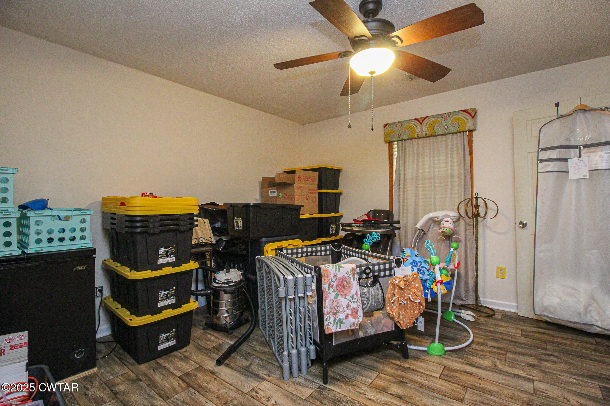 60 Moore Avenue Friendship, TN 38034 - Photo 10 of 14 a storage room with furniture and musical instruments