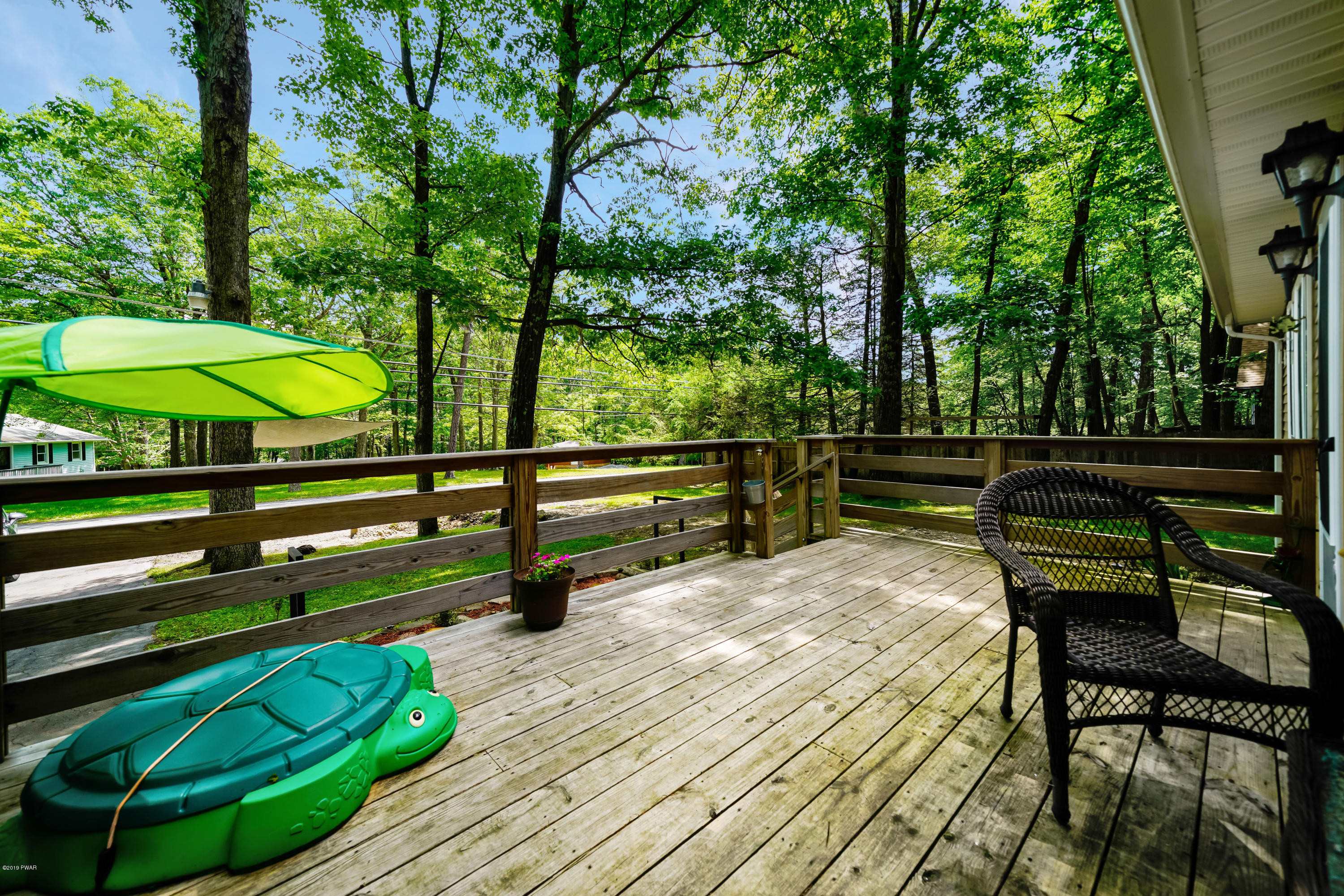 176 Gold Key Road Milford, PA 18337 - Photo 21 of 27 a view of a bench in a backyard