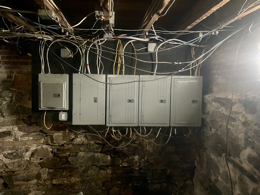 82 Mill Street Worcester, MA 01603 - Photo 28 of 39 a view of a room with wooden walls