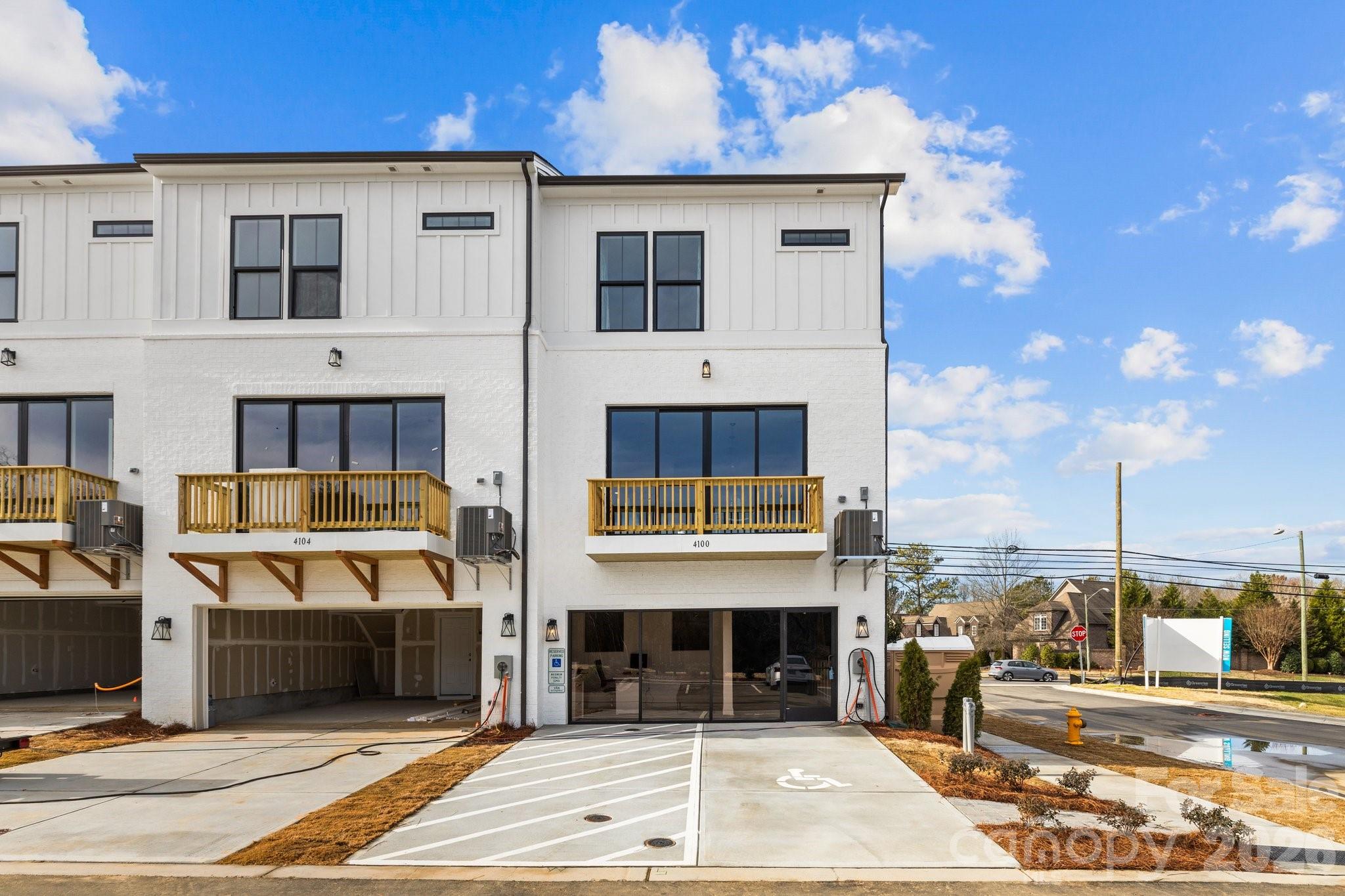 3023 Rozzelles Ferry Road Charlotte, NC 28208 - Photo 21 of 25 a front view of a house with a garden