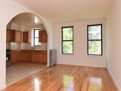 547 83rd Street Brooklyn, NY 11209 - Photo 5 of 12 a view of livingroom with furniture and windows
