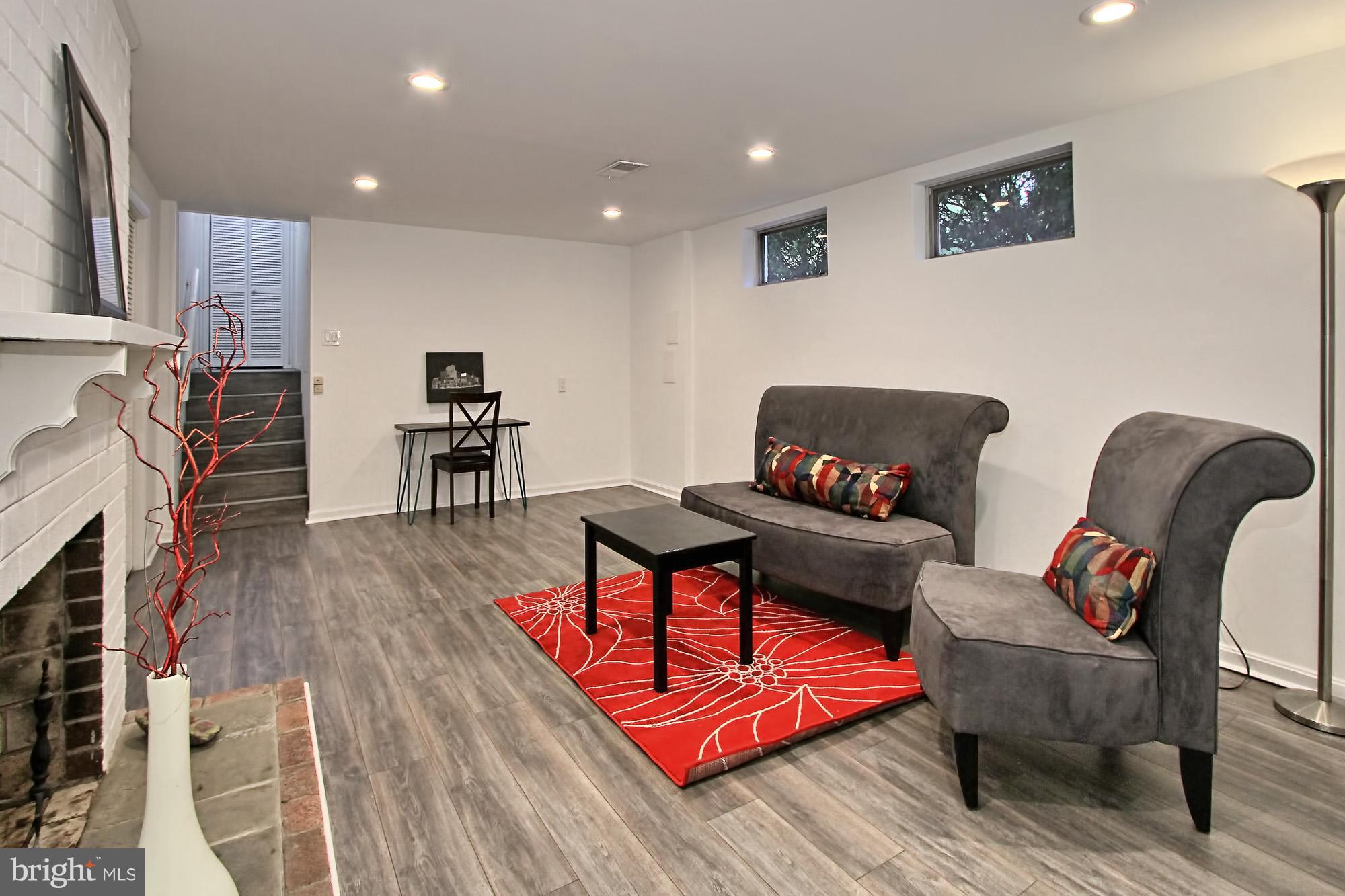 7910 Greeley Boulevard Springfield, VA 22152 - Photo 2 of 29 Newly finished with fireplace, recessed lights