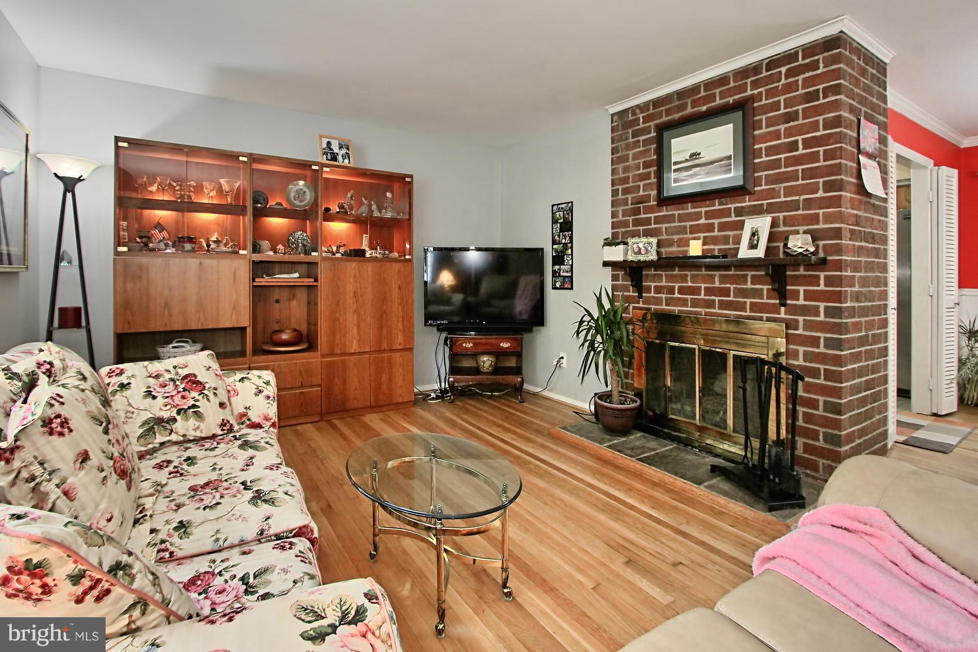 7910 Greeley Boulevard Springfield, VA 22152 - Photo 11 of 29 Fireplace in living room