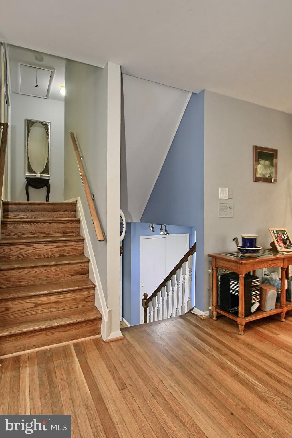 7910 Greeley Boulevard Springfield, VA 22152 - Photo 14 of 29 Hardwood stairs, convenient split staircase