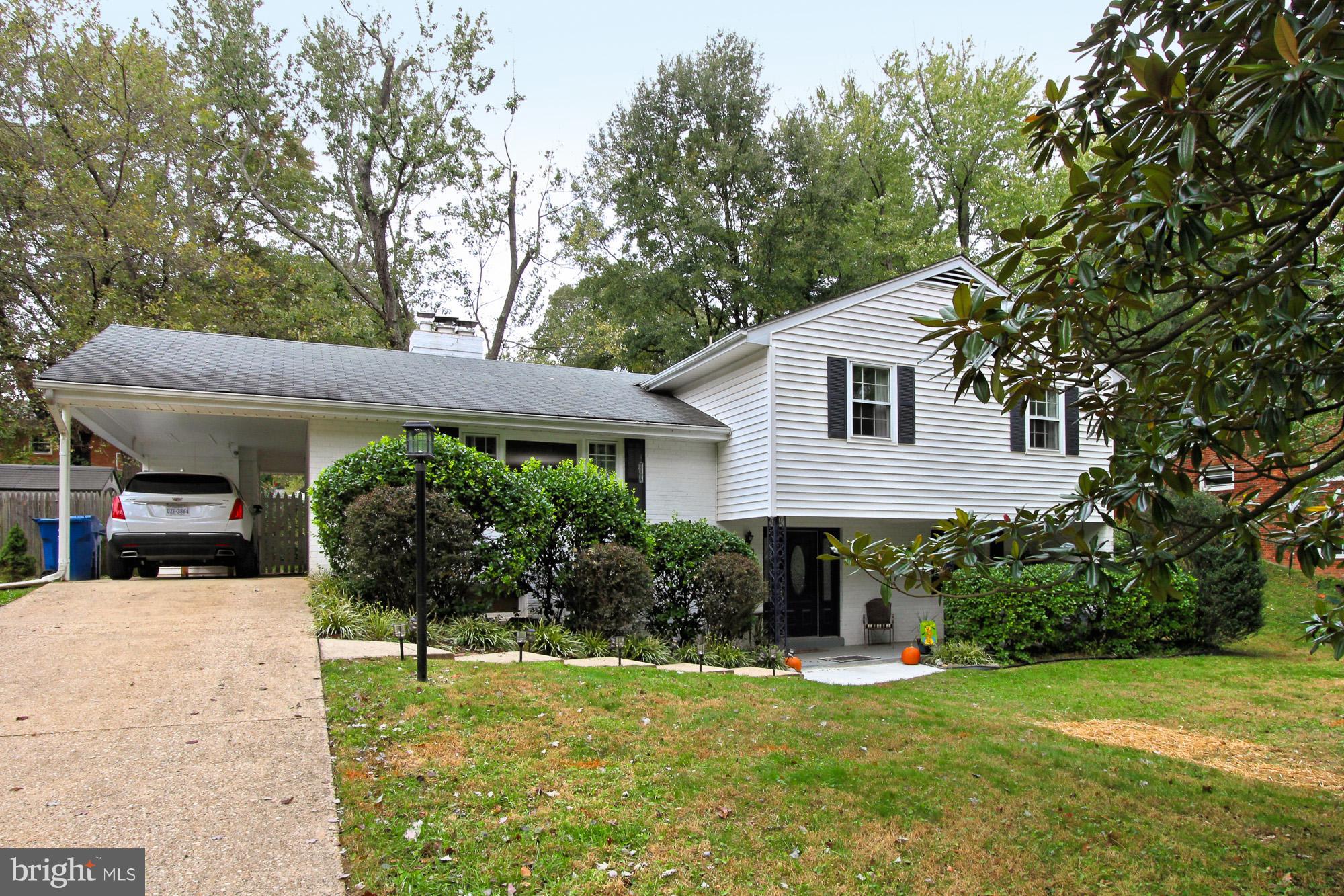 7910 Greeley Boulevard Springfield, VA 22152 - Photo 7 of 29 Carport, long concrete driveway, solar lights
