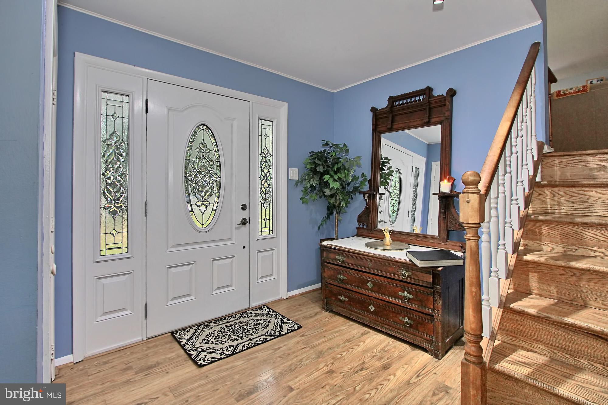 7910 Greeley Boulevard Springfield, VA 22152 - Photo 9 of 29 Welcoming foyer with striking door