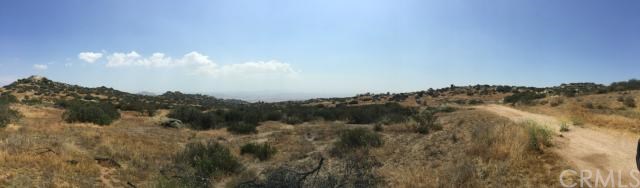 a view of a lake in middle of forest