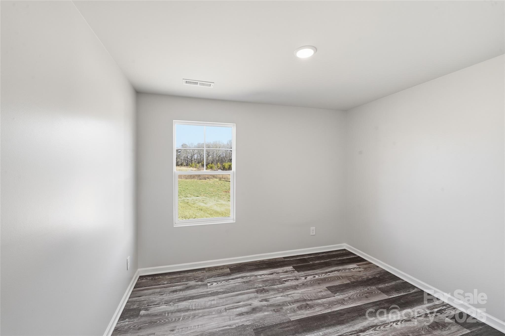 1532 Null Road Lincolnton, NC 28092 - Photo 15 of 32 an empty room with a window