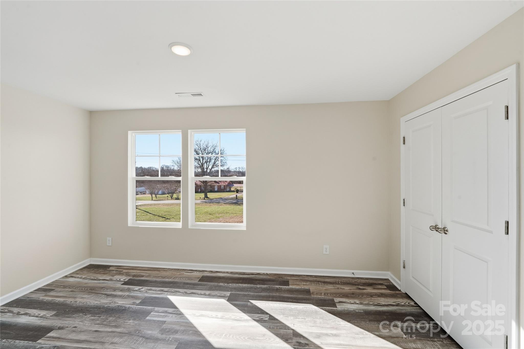 1532 Null Road Lincolnton, NC 28092 - Photo 17 of 32 a view of an empty room with a window
