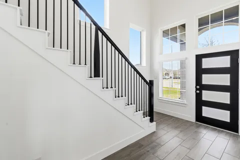 a view of large kitchen with stainless steel appliances kitchen island