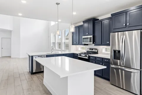 a bathroom with a shower and a bath tub