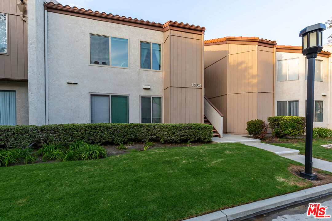 1754 Sinaloa Road, Unit 274 Simi Valley, CA 93065 - Photo 2 of 23 a view of a back yard of the house