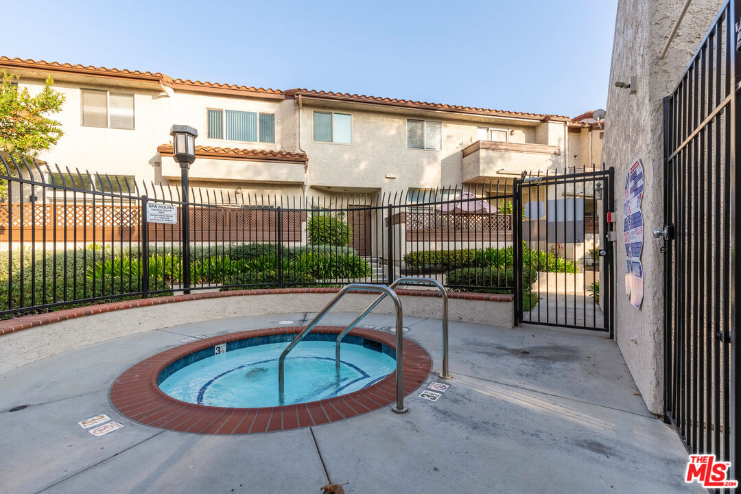 1754 Sinaloa Road, Unit 274 Simi Valley, CA 93065 - Photo 23 of 23 a view of a balcony with a swimming pool