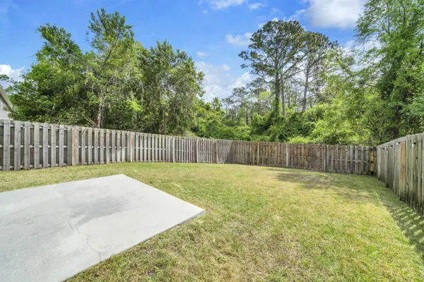 a swimming pool with wooden fence