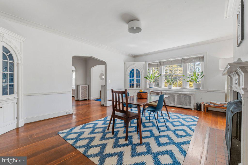 2 East Highfield Road Baltimore, MD 21218 - Photo 13 of 46 a dining room with furniture and wooden floor