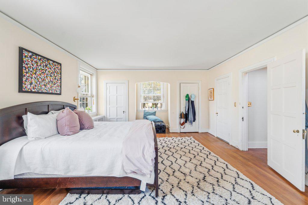2 East Highfield Road Baltimore, MD 21218 - Photo 24 of 46 a bedroom with a large bed and a window