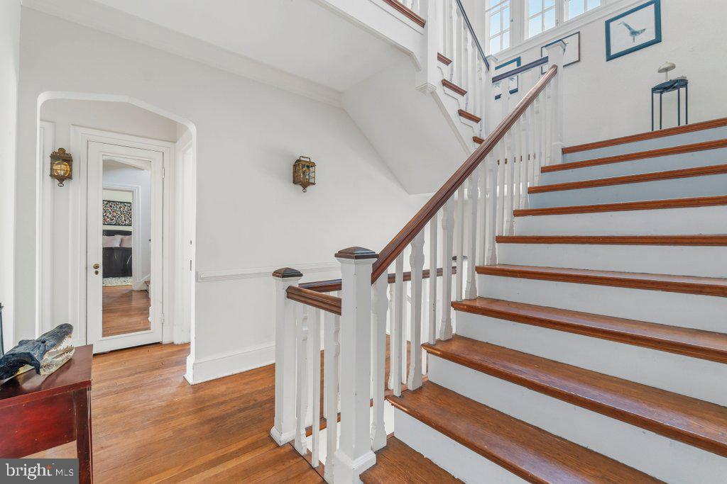 2 East Highfield Road Baltimore, MD 21218 - Photo 26 of 46 a view of entryway with wooden floor and front door
