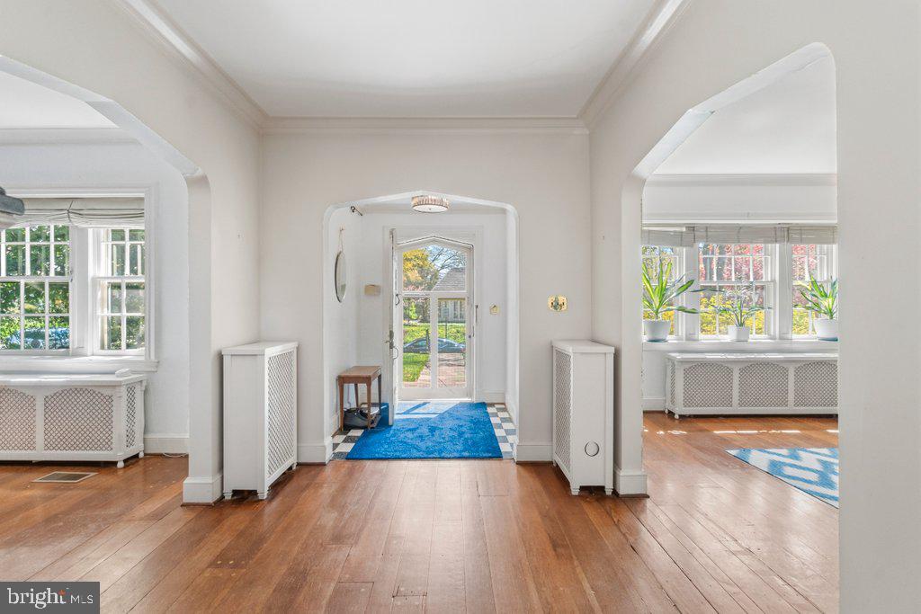 2 East Highfield Road Baltimore, MD 21218 - Photo 4 of 46 wooden floor and windows in a room