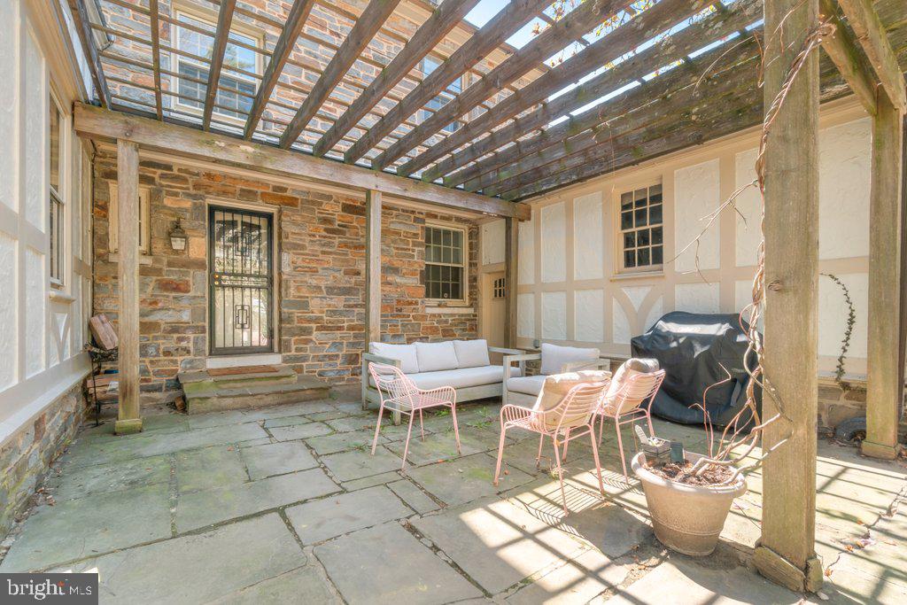 2 East Highfield Road Baltimore, MD 21218 - Photo 44 of 46 a outdoor space with lots of furniture and windows