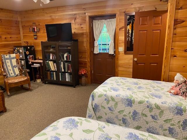 260 Deer Ridge Trail Ocoee, TN 37361 - Photo 62 of 72 a bedroom with a bed and flat screen tv