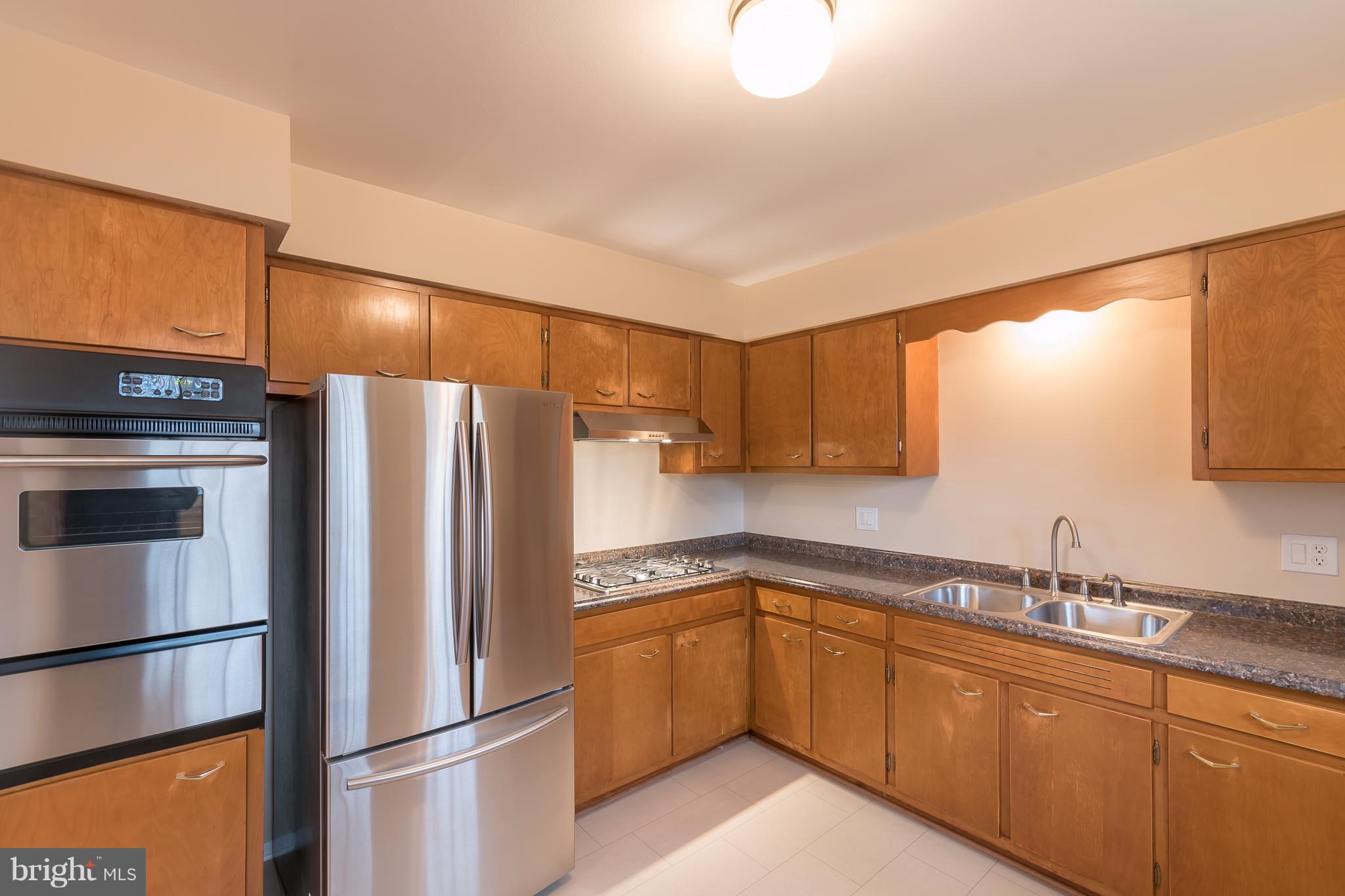 5506 Inverchapel Road Springfield, VA 22151 - Photo 11 of 29 Kitchen with Stainless Steel Appliances
