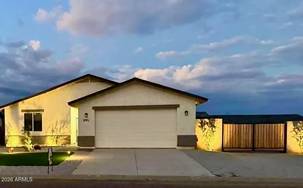 a front view of a house with a garage