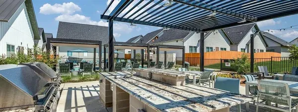 an outdoor view of the patio and dining space