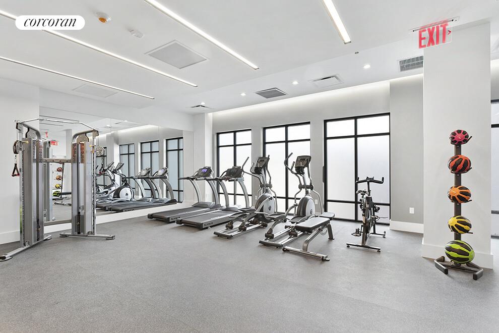 123 Hope Street, Unit 4C Brooklyn, NY 11211 - Photo 8 of 13 a view of a room with gym equipment