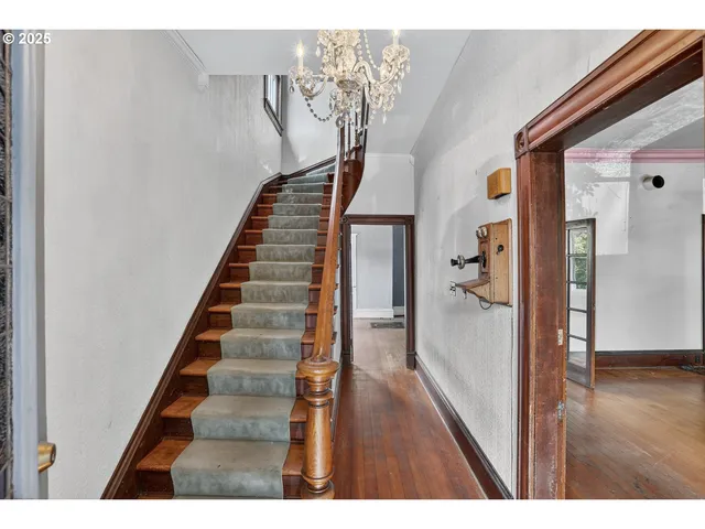 a view of entryway with wooden floor
