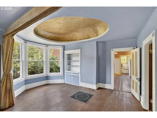 a view of an empty room and window