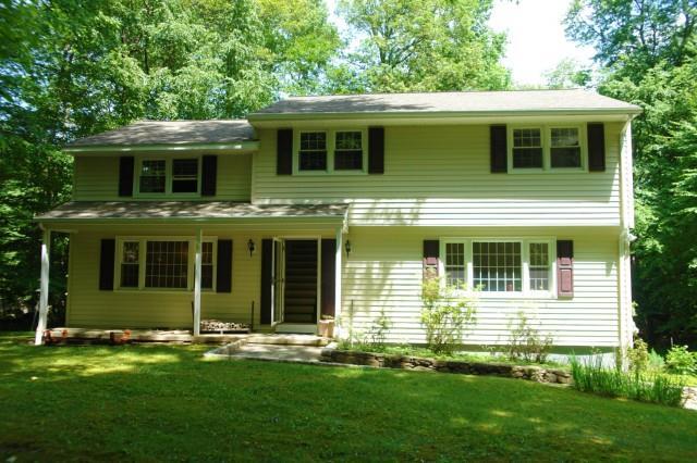 113 Seth Low Mountain Road Ridgefield, CT 06877 - Photo 1 of 1 a view of a house with a yard and large window
