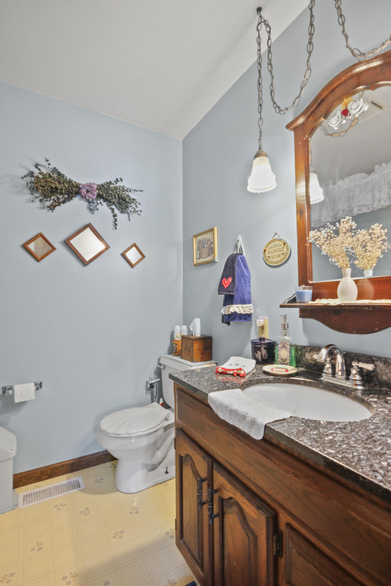 9272 Vigo Street Crown Point, IN 46307 - Photo 5 of 21 a bathroom with a granite countertop sink mirror vanity and toilet