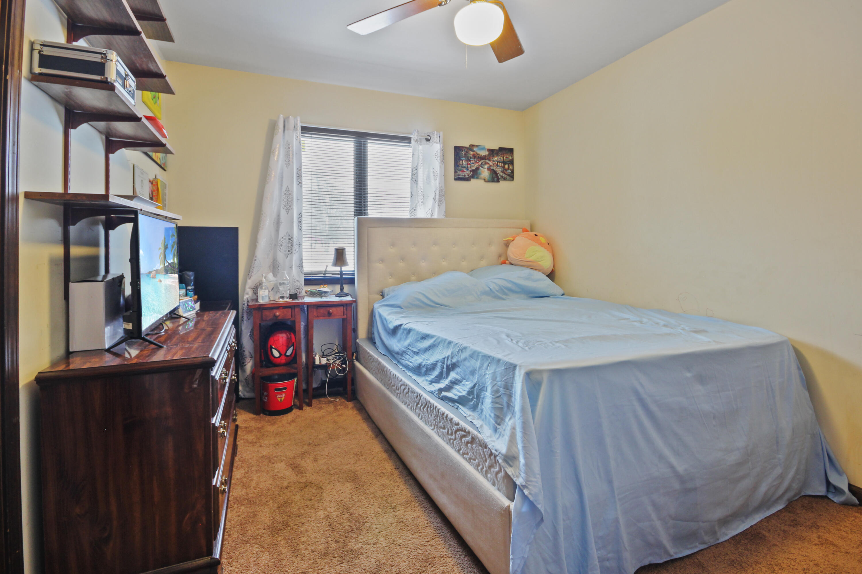 9272 Vigo Street Crown Point, IN 46307 - Photo 6 of 21 a bedroom with a bed and dresser