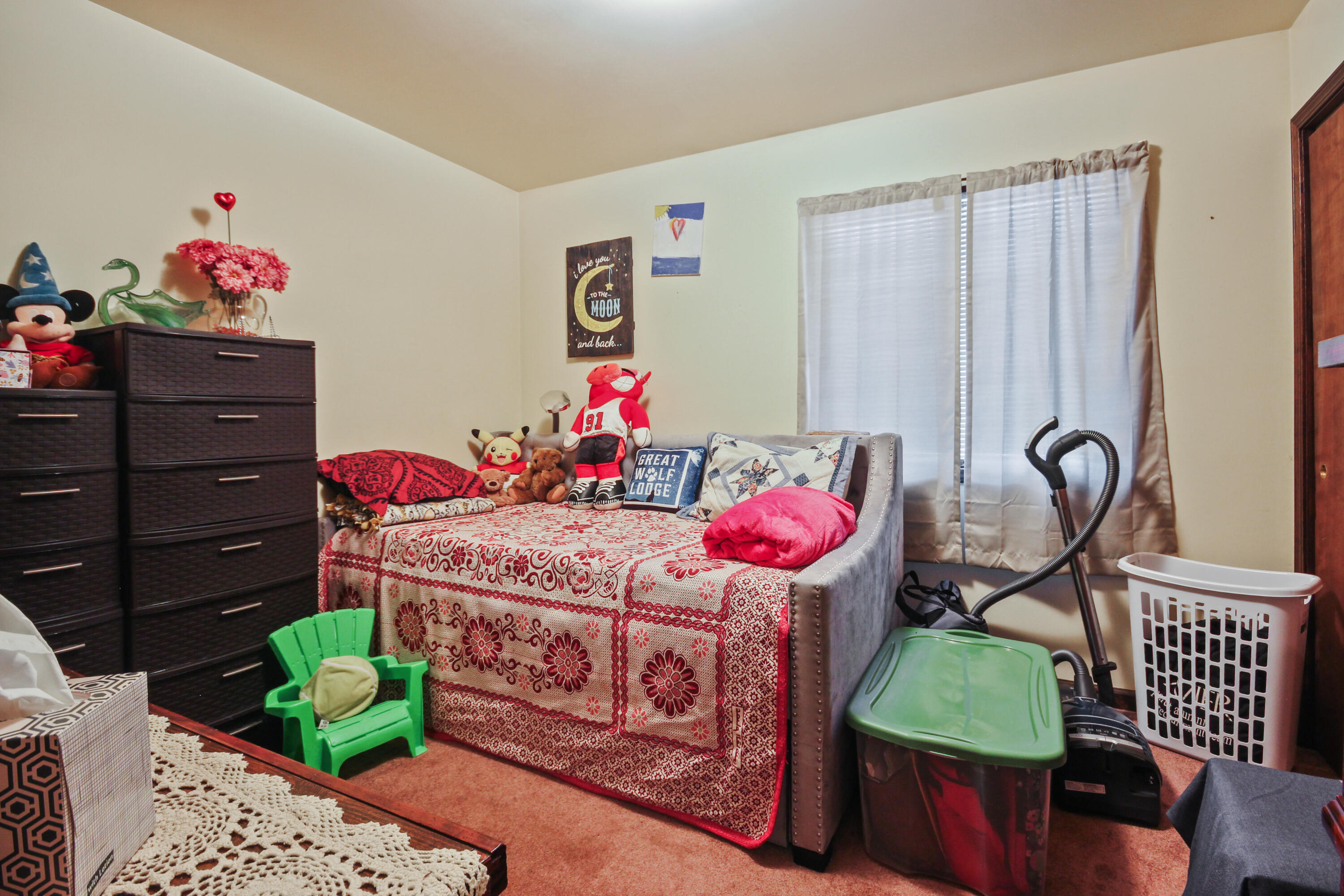 9272 Vigo Street Crown Point, IN 46307 - Photo 7 of 21 a bedroom with a bed cabinets and a dresser
