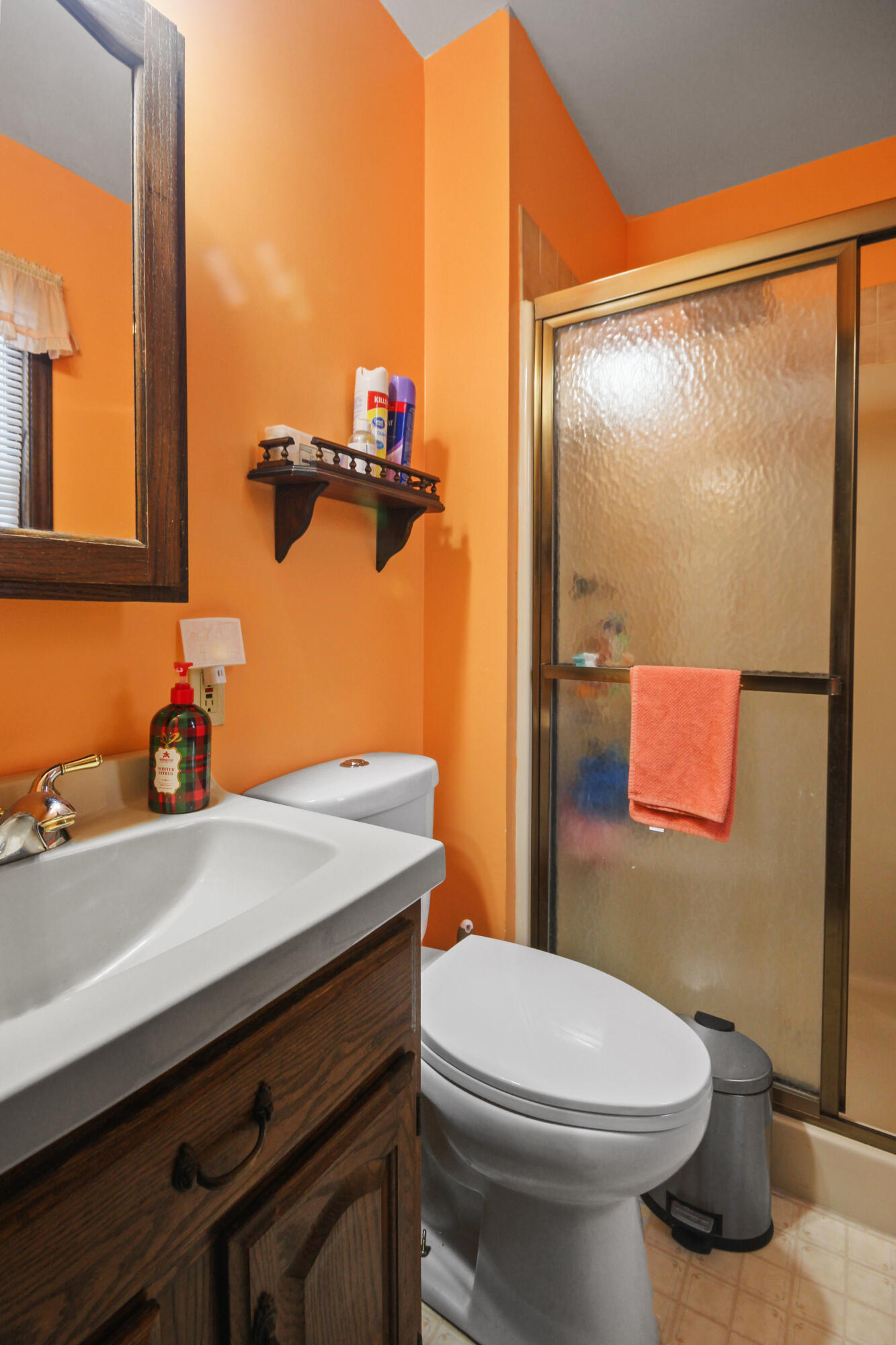 9272 Vigo Street Crown Point, IN 46307 - Photo 9 of 21 a bathroom with a sink a toilet and shower