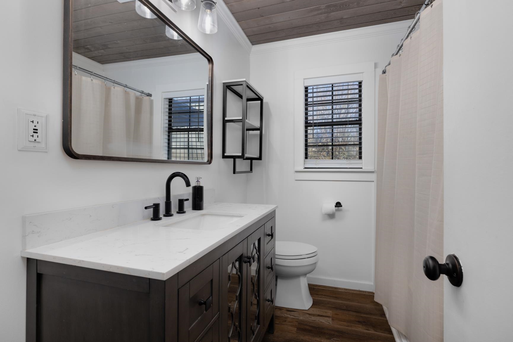 8424 Old Memphis Road Brighton, TN 38011 - Photo 15 of 29 a bathroom with a sink toilet and mirror