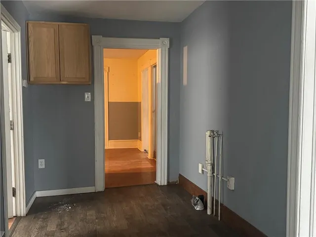 a view of an empty room and window