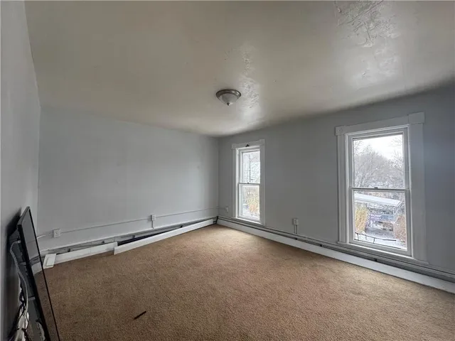 an empty room with windows